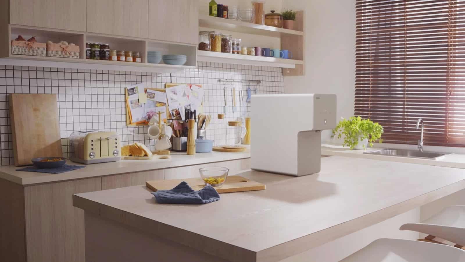 home water purifier being perfectly blended in a home kitchen environment coway
